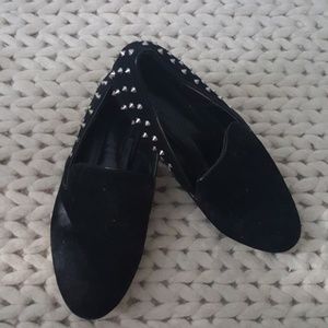 Studded black loafers